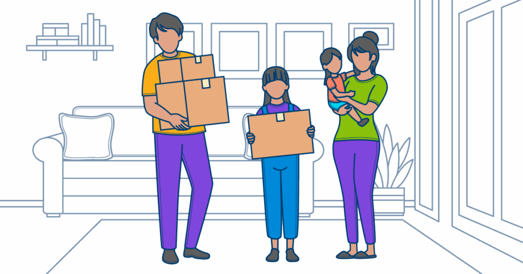 A family with two children holding moving boxes in their Ottawa home, prepared for a seamless moving experience with trusted Ottawa movers.