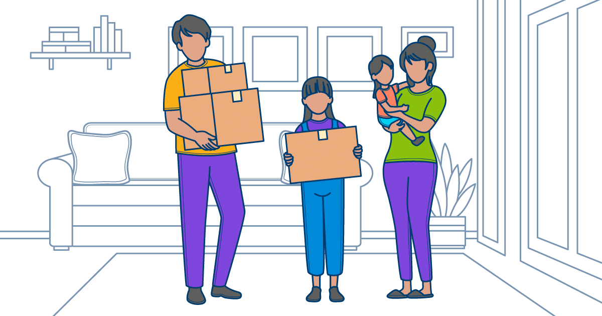 A family with two children holding moving boxes in their Ottawa home, prepared for a seamless moving experience with trusted Ottawa movers.